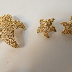 Beautiful gold tone starfish earrings and matching brooch